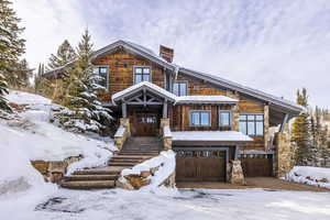 View of front facade featuring a garage