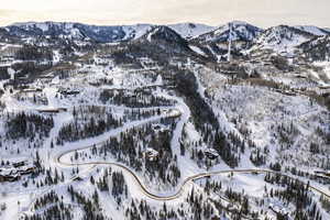 Snowy aerial view with a mountain view