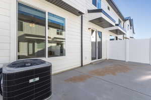 View of patio with central AC unit