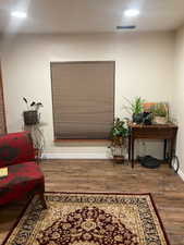 Interior space with hardwood / wood-style floors