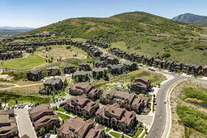 Birds eye view of property featuring a mountain view