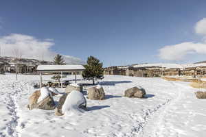 View of yard covered in snow