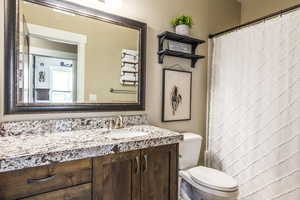 Bathroom with vanity and toilet