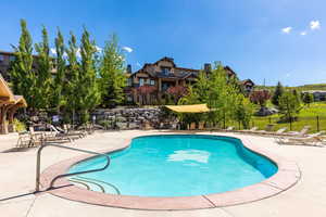 View of pool with a patio