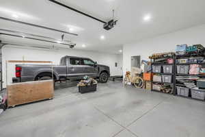 Garage featuring a garage door opener