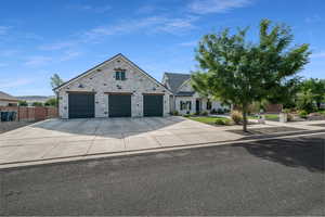 View of front facade featuring a garage