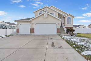 Front of property featuring a 3-car garage