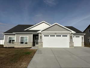 Craftsman-style home with a garage