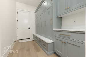 Mudroom featuring light hardwood / wood-style floors