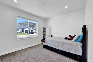 Bedroom featuring carpet floors