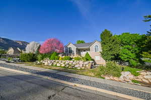 View of front of property featuring stucco siding and a mountain view