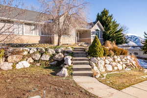 View of front of house with a mountain view