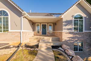 Property entrance featuring a porch