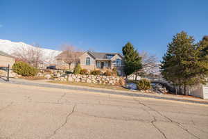 View of front of home with a mountain view