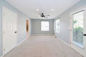 Unfurnished room with baseboards, light carpet, recessed lighting, and ceiling fan