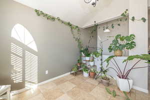 Interior space featuring lofted ceiling