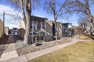 View of front of home with a balcony