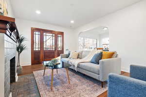 Living room featuring dark hardwood / wood-style flooring