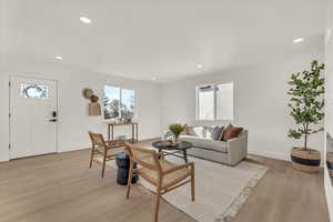 Living room with light wood-type flooring