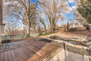 Wooden terrace with central AC unit