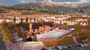 Birds eye view of property featuring a mountain view