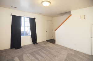 View of carpeted spare room