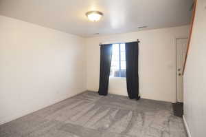 View of carpeted spare room