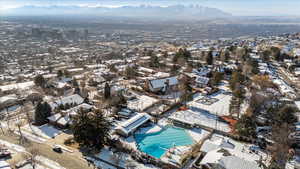 Snowy aerial view with a mountain view