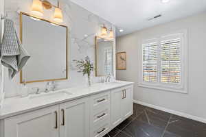 Bathroom featuring vanity