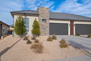 View of front of house with a garage