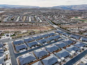 Birds eye view of property with a mountain view