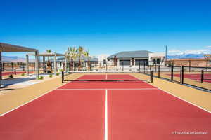View of sport court featuring community basketball court and fence
