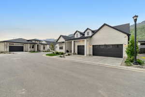 View of front of home featuring a garage