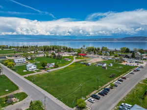 Drone / aerial view with a water and mountain view