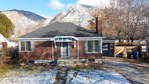 Bungalow-style home with a mountain view