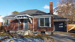 Bungalow-style home featuring a garage