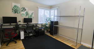 Office area featuring light hardwood / wood-style flooring