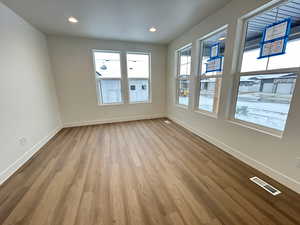 Empty room featuring light hardwood / wood-style floors