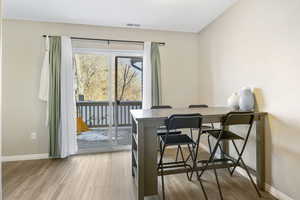 Dining space featuring light hardwood / wood-style floors