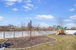 View of yard featuring a playground