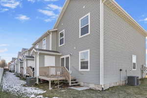 Back of property with central air condition unit