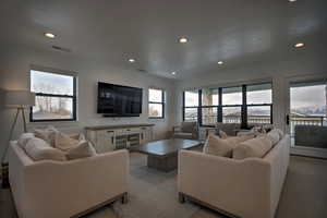 Living room featuring a wealth of natural light