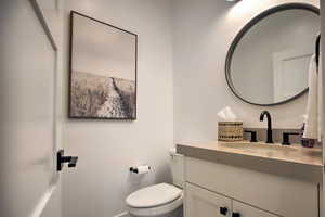 Bathroom with vanity and toilet