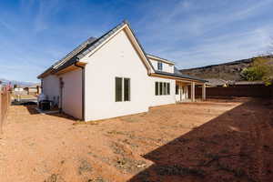 Rear view of property featuring a mountain view