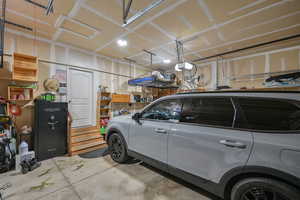 Garage featuring a garage door opener