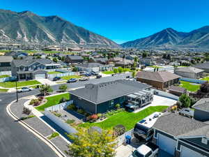 Birds eye view of property with a mountain view