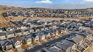 Birds eye view of property with a mountain view