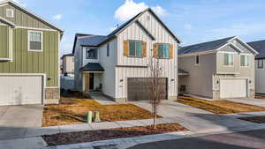 View of front of property with a garage