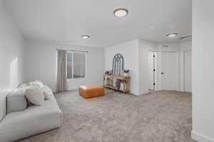 Loft/Living area featuring carpet.