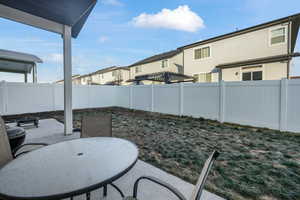 View of patio featuring a pergola.